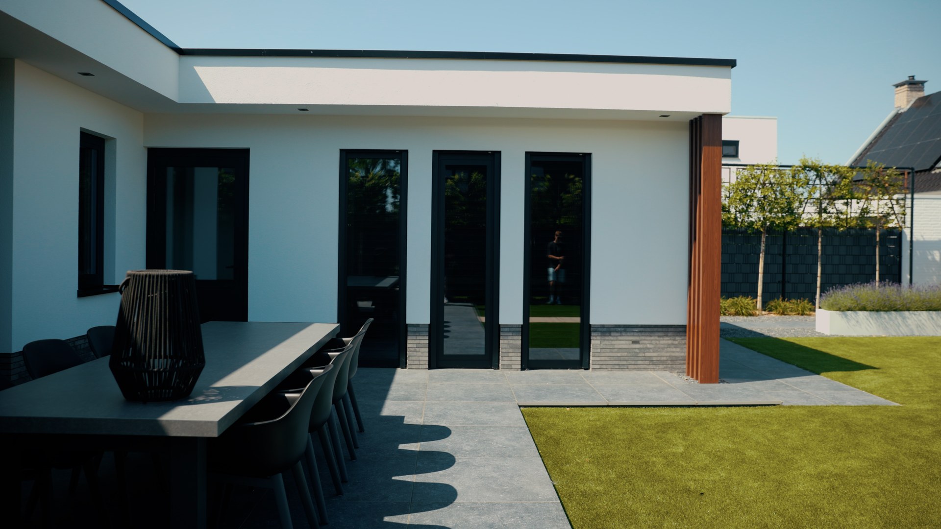 Terras met schuifpui en tuinkamer